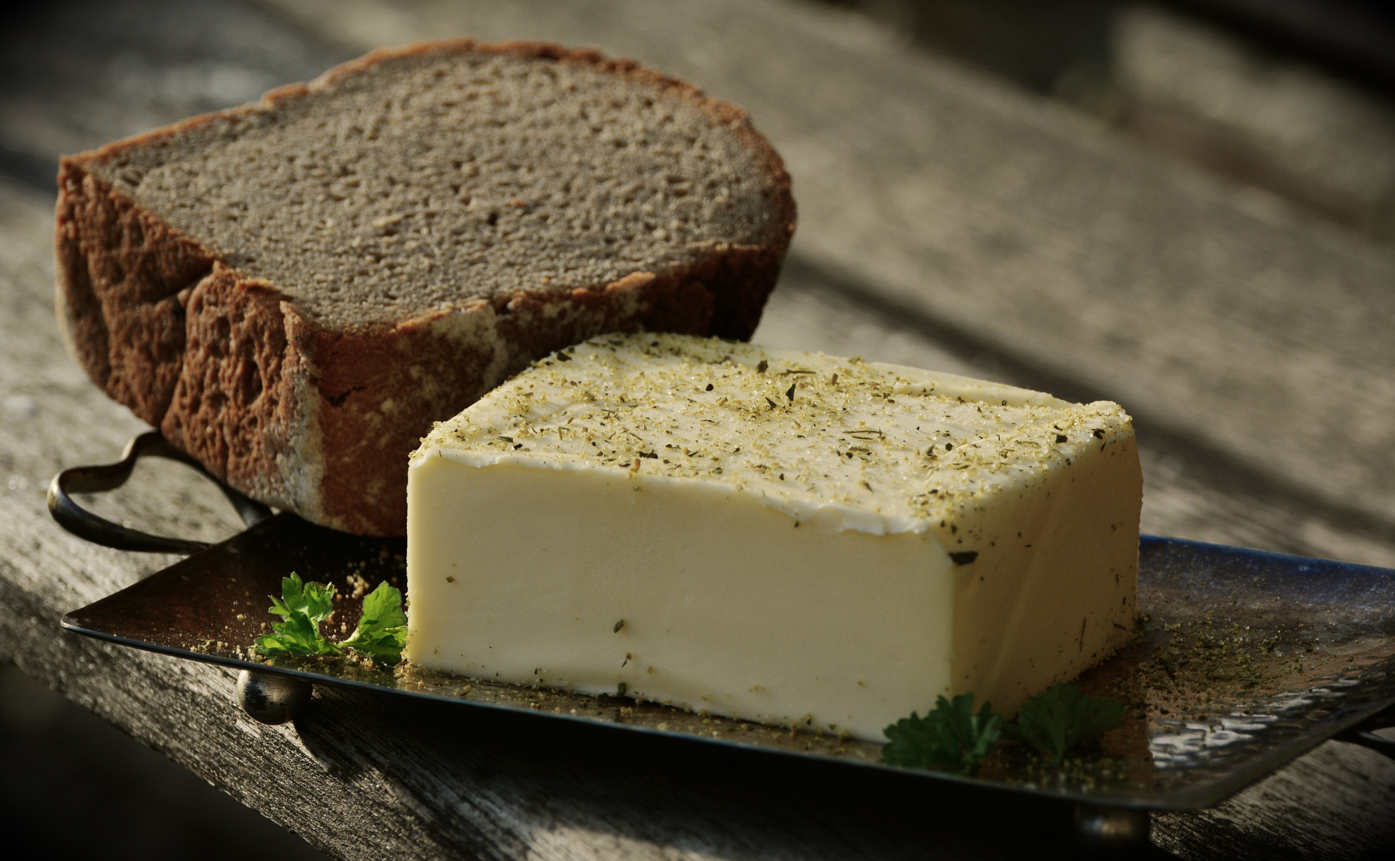 Butter and Bread on a Wooden Background